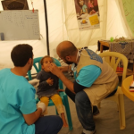 Screening in a refugee camp